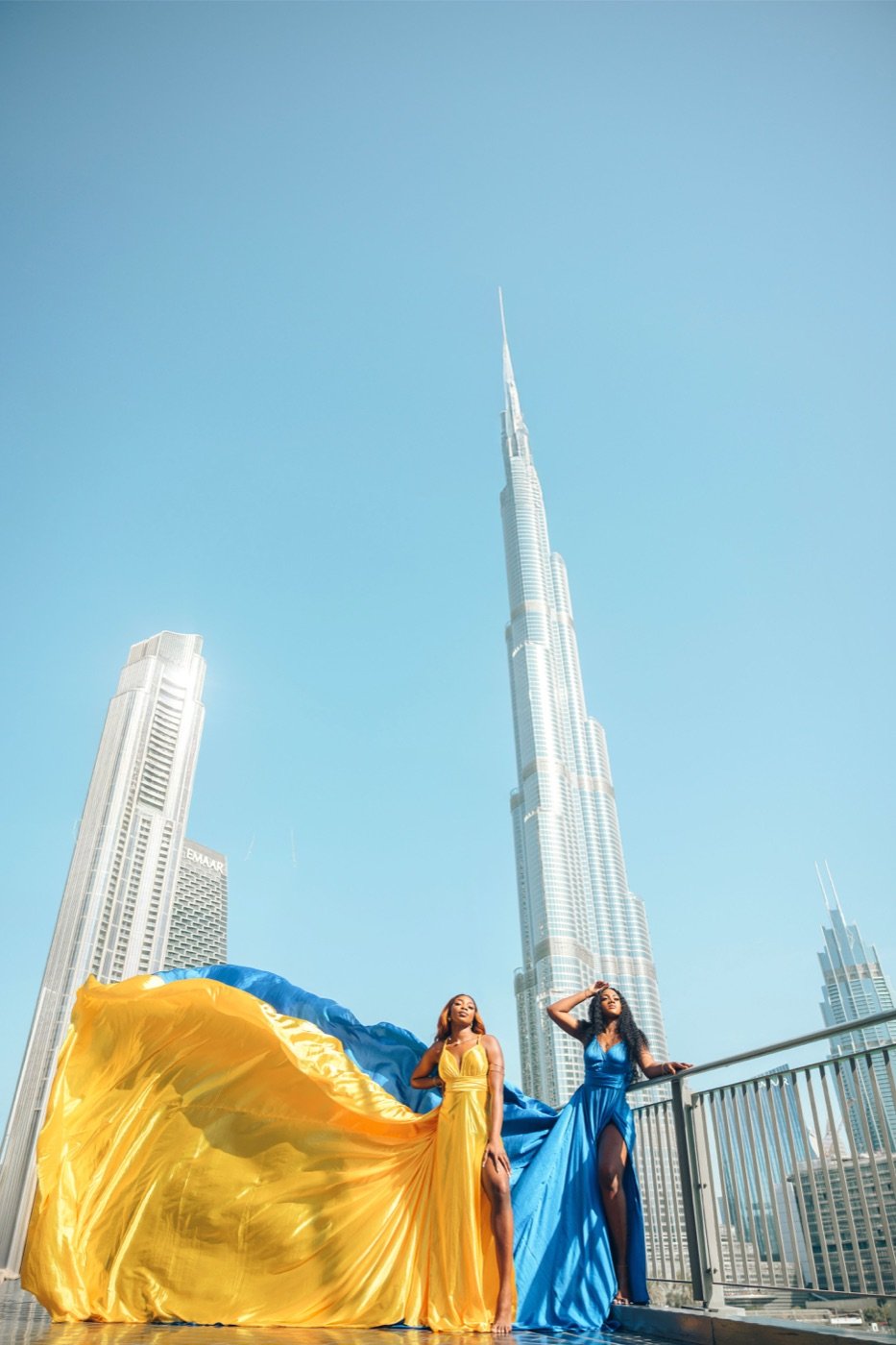 Flying dress photoshoot with the Dubai city skyline